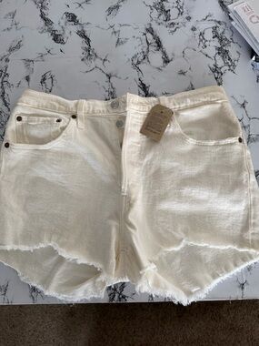 Levi's Cream Frayed Hem Denim Shorts